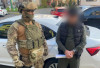 Закарпатському адвокатові, який за хабарі незаконно сприяв військовослужбовцям у звільненні зі служби, "світять" 10 років тюрми (ФОТО)